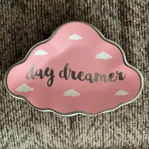 Pink day dreamer ring dish with silver font and white clouds from Cracker Barrel